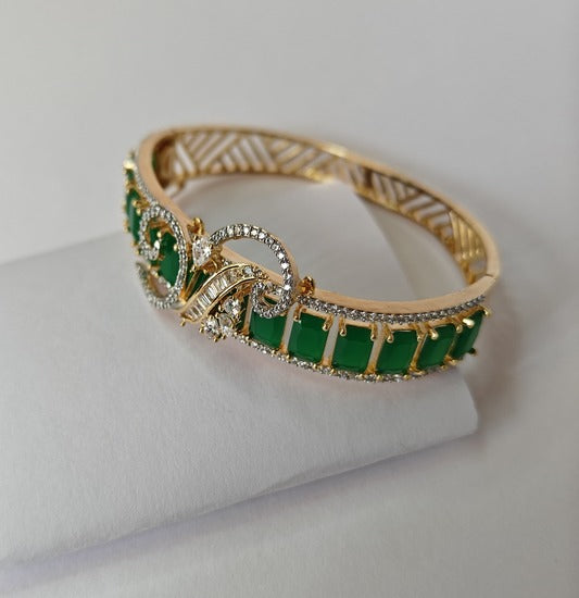 Stylish Gold-toned Party Wear Bracelet with Green Stone & American Diamond