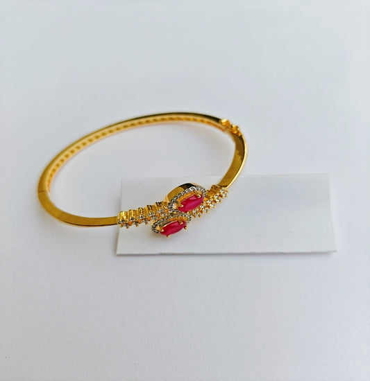 Classic Charm Gold-toned American Diamond Bracelet with Ruby Red Gemstones
