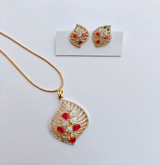 Leaf Shaped Gold-toned American Diamond Pendant and Earrings Set with Red Gemstones