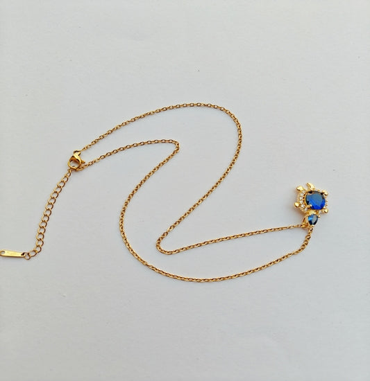 Delicate Gold-toned Chain with Blue Gemstone Pendant