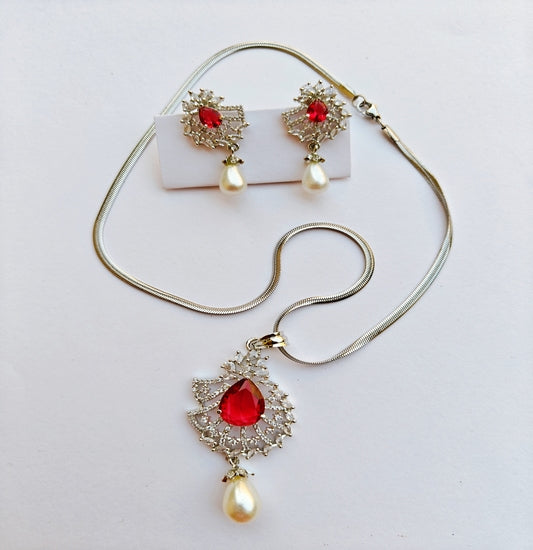 Silver-toned Red Stone & Pearl Drop American Diamond Pendant Earrings Set