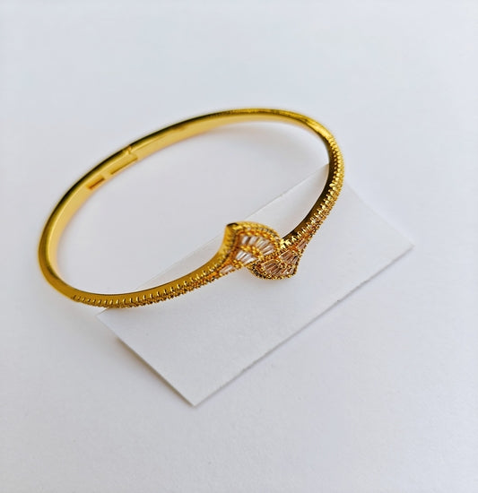 Regal Aura Gold-Toned Designer American Diamond Bracelet