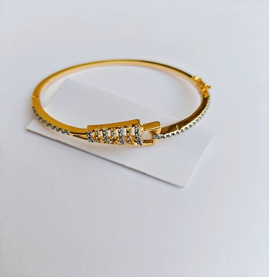 Elegant Gold-toned American Diamond Bracelet with Intricate Diamond-Cut Design