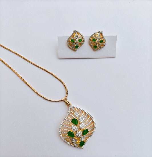 Leaf Shaped Gold-toned American Diamond Pendant and Earrings Set with Green Gemstones