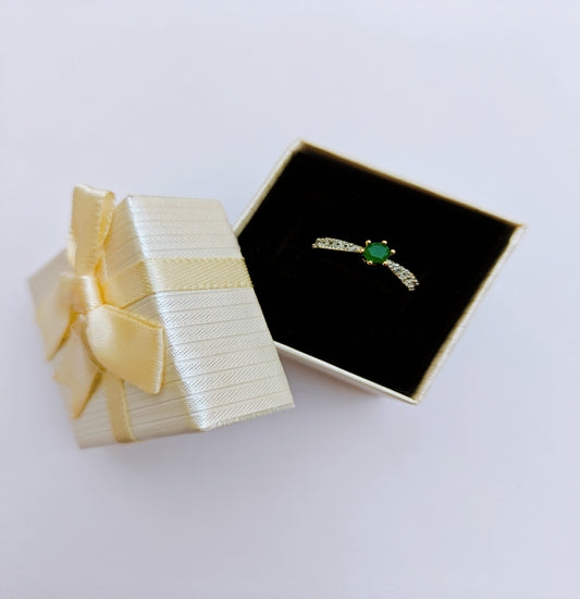 Elegant Gold-toned American Diamond Ring with Emerald Green Gemstone as Centerpiece