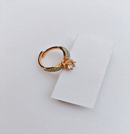 Elegant Gold-Toned Solitaire Ring with Sparkling American Diamonds