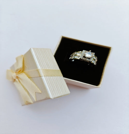 Silver-Toned American Diamond Solitaire Ring with Sparkling Side Stones