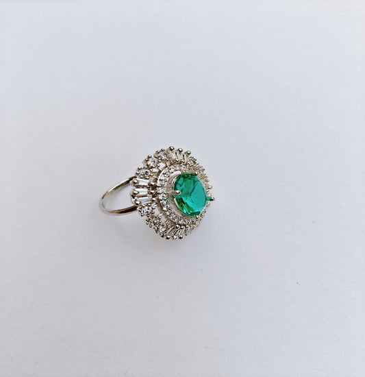 American Diamond Silver toned Ring with a prominent Green Oval Gemstone