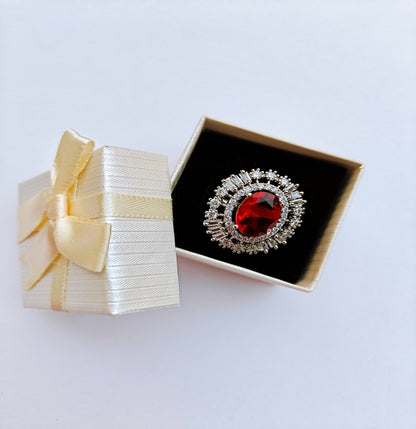 American Diamond Silver toned Ring with a prominent Red Oval Gemstone