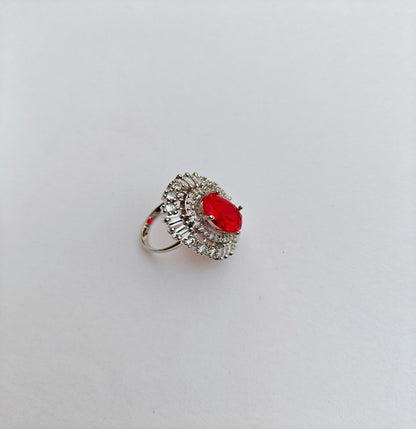 American Diamond Silver toned Ring with a prominent Red Oval Gemstone